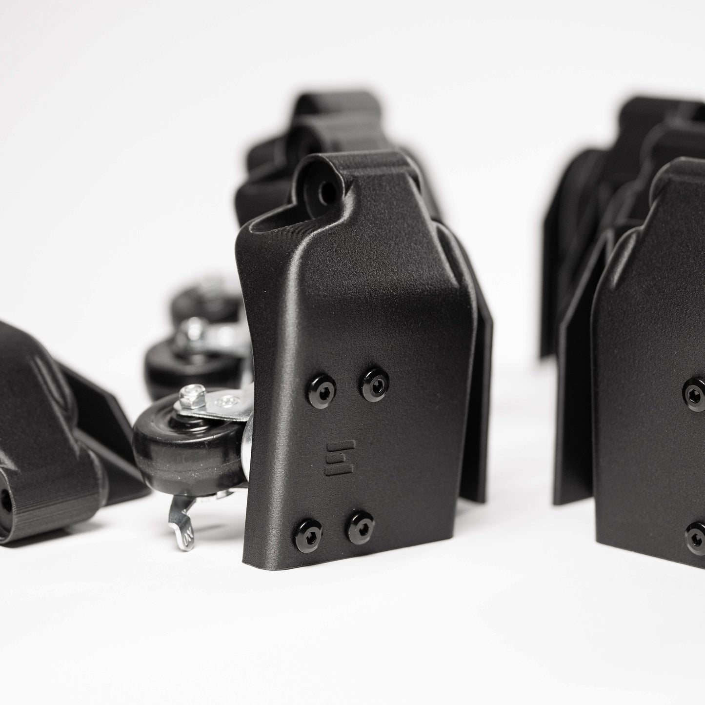 Close-up of carbon fiber plastic caster kit