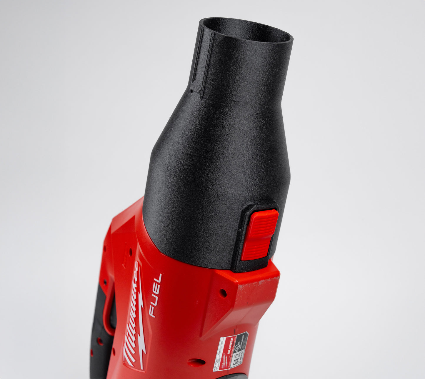 Milwaukee 3017-20 blower standing vertically with the Arbite ShortFlow nozzle mounted, showcasing a compact footprint.