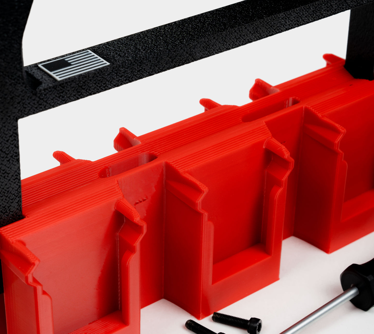 removing side bolt from Milwaukee Charge Pack handle to access hidden AirTag compartment