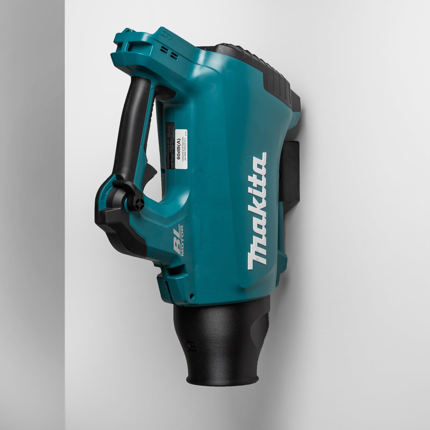 angled view of mounted Makita XBU03Z blower for space-saving display