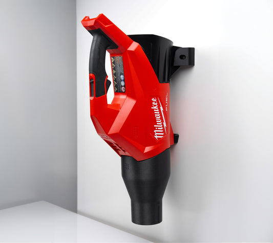 Milwaukee 3017-20 leaf blower mounted on custom wall mount, shown in vertical position for compact tool storage.