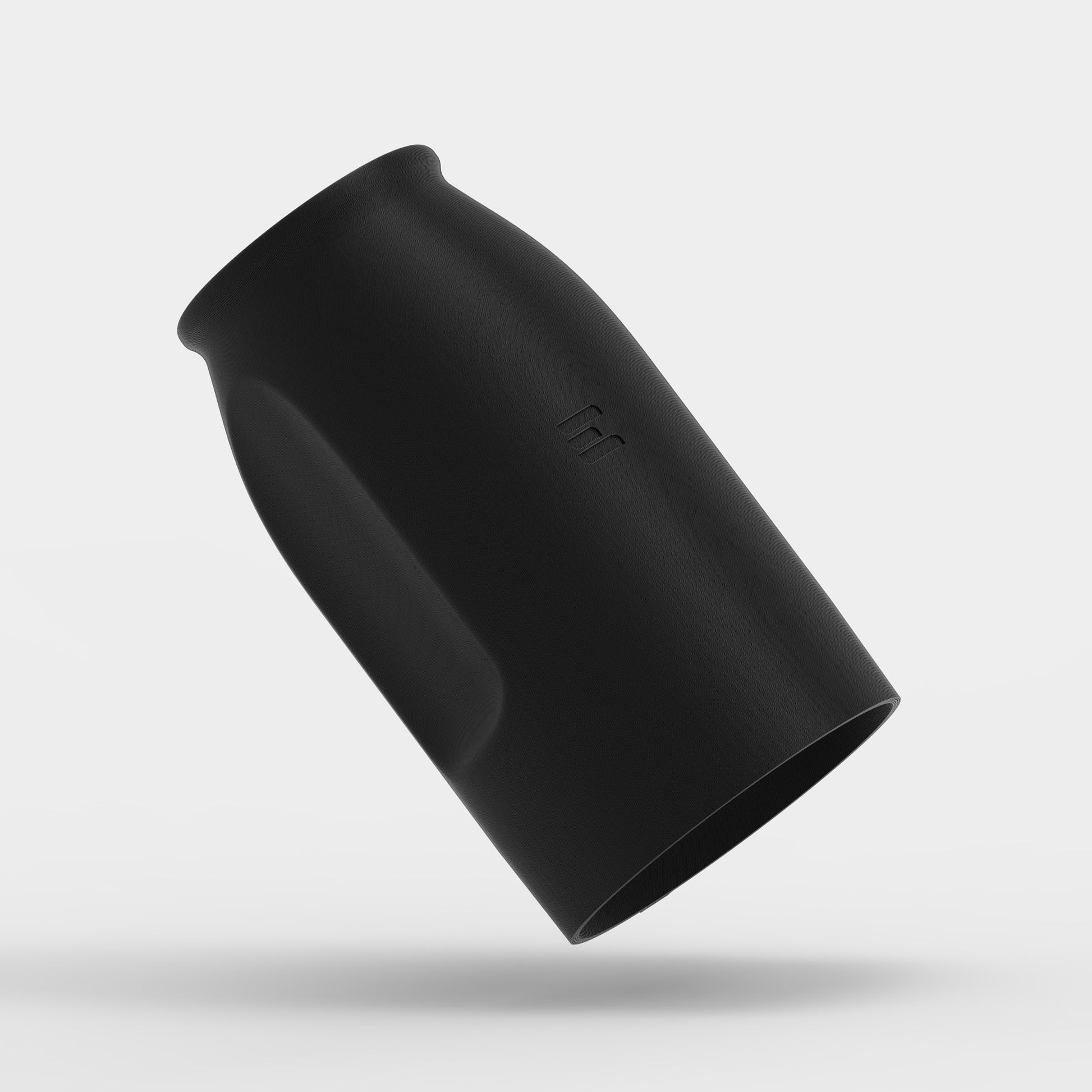 angled close-up of air concentrator nozzle showing sleek black surface
