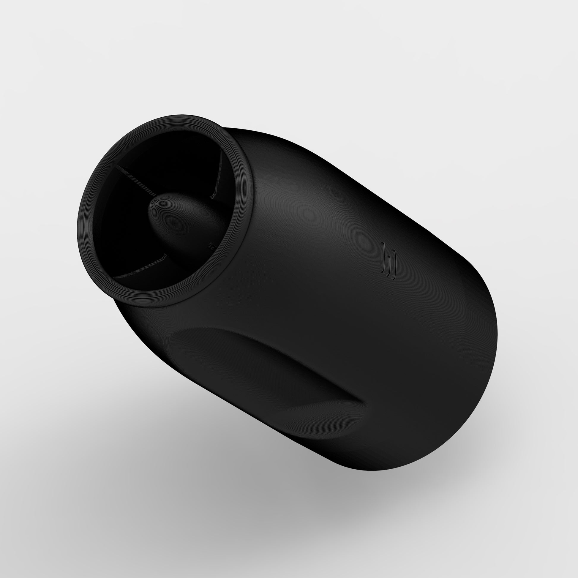 angled close-up of air concentrator nozzle showing sleek black surface