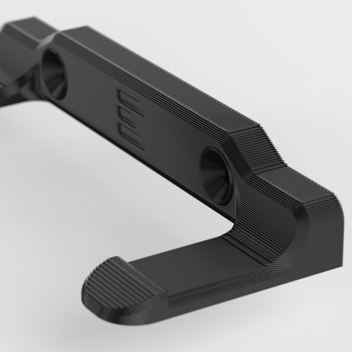 close-up of Milwaukee wall mount with integrated washer design for improved strength and durability