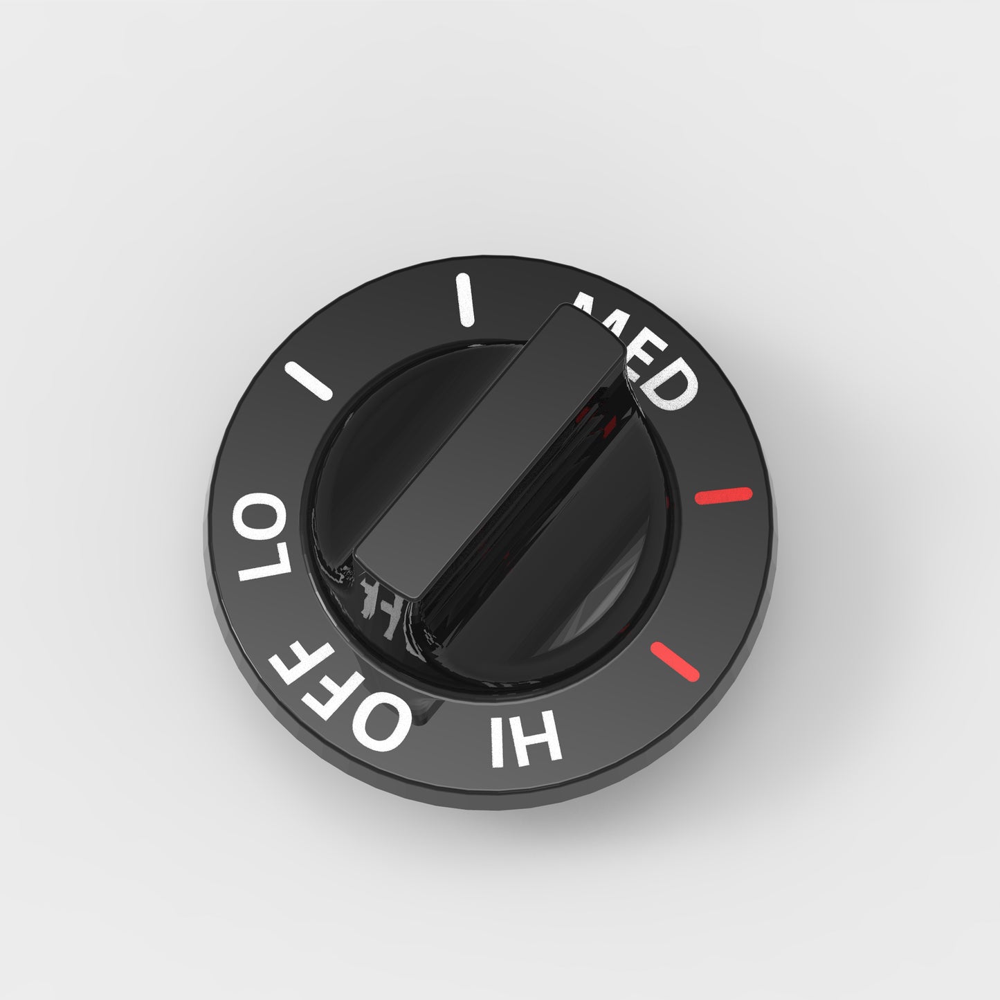 top-down view of burner knob showing temperature control markings
