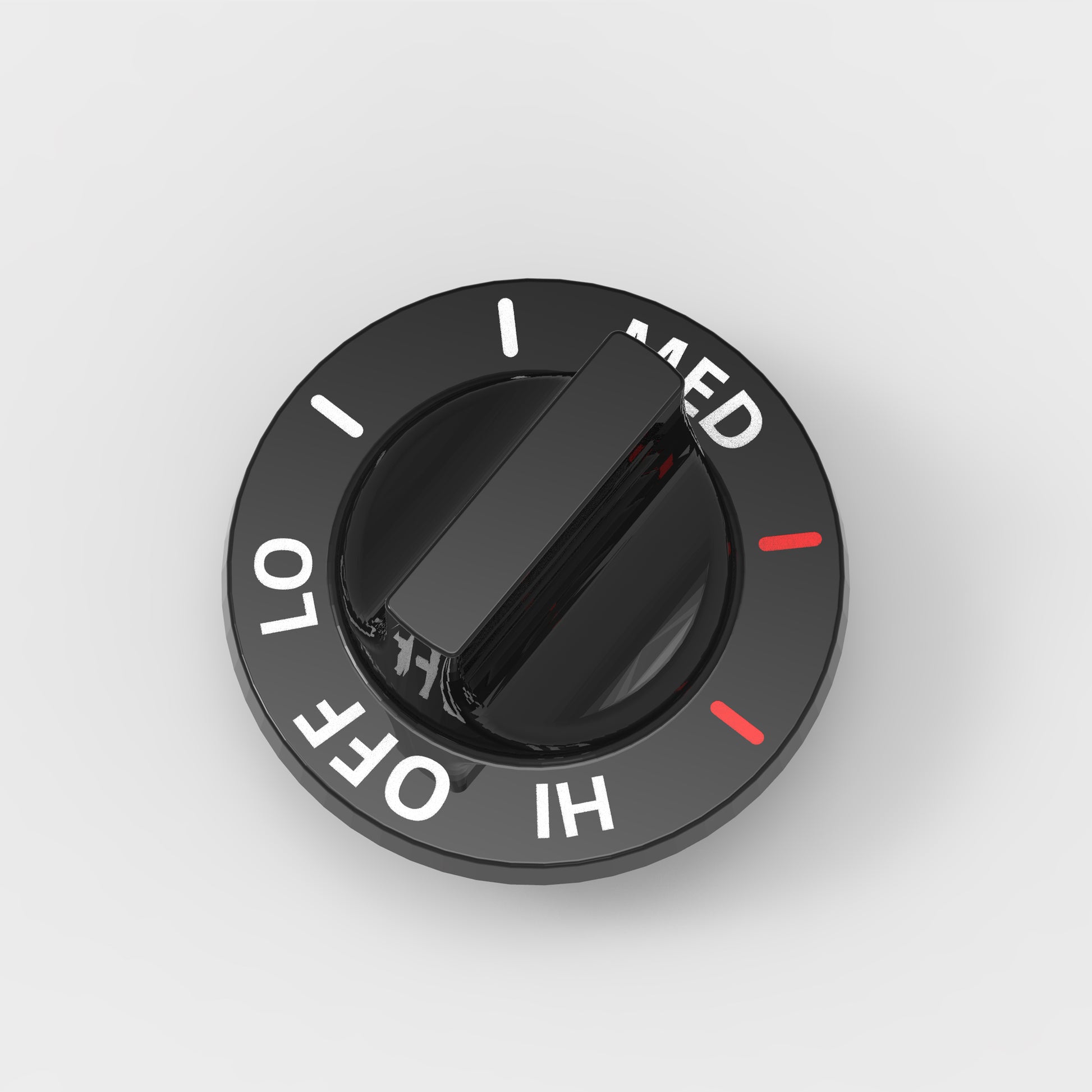 top-down view of burner knob showing temperature control markings
